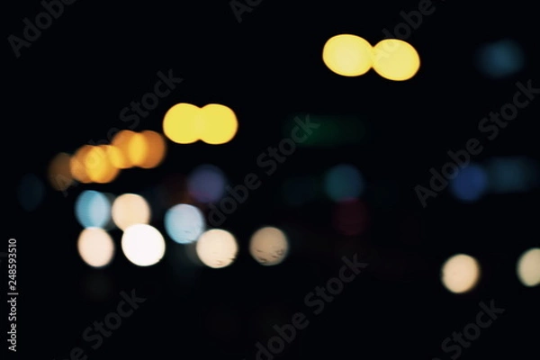 Fototapeta Light spots on black background