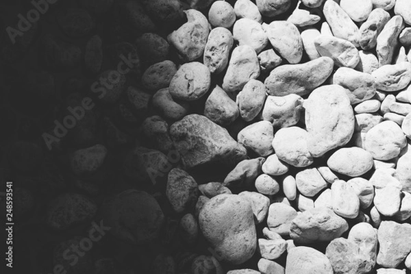 Fototapeta Pebbles and stones from beach background pattern