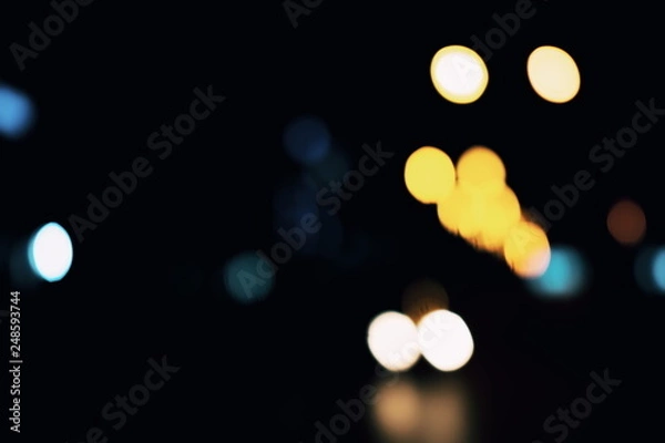 Fototapeta Light spots on black background