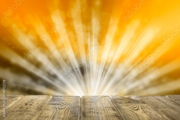 Fototapeta Empty wooden table on golden abstract background