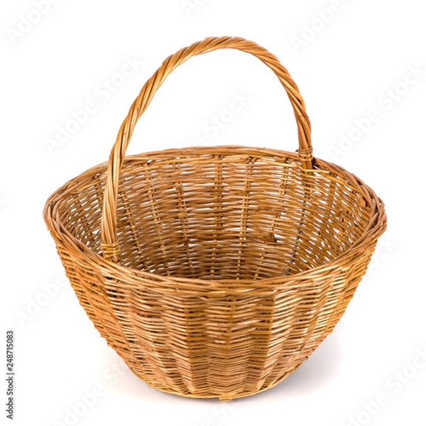 Fototapeta Empty wicker basket for fruits and vegetables, isolated on white
