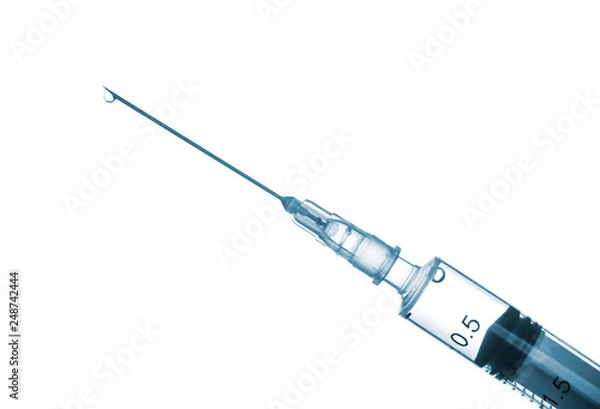 Obraz Syringe with an injection solution on white background with copy space