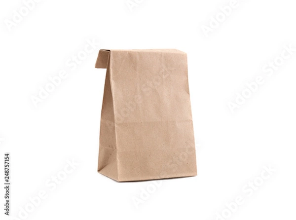 Obraz Paper brown bag for goods. Isolate. Studio photography