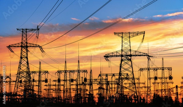 Obraz High-voltage power lines. Electricity distribution station. high voltage electric transmission tower. Distribution electric substation with power lines and transformers