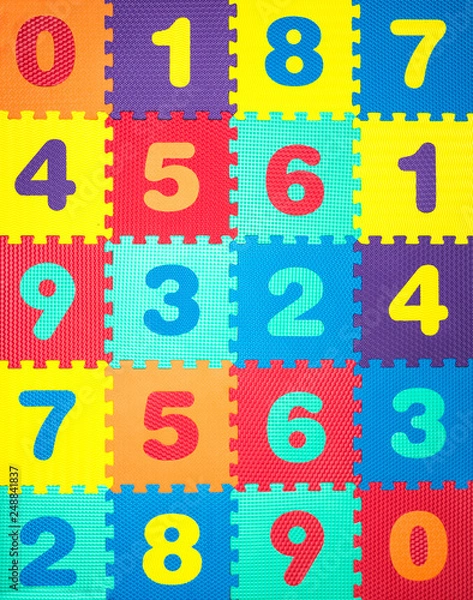 Fototapeta Colorful Baby Mat. Rubber foam pad for children playing. Colorful background ackground with digits