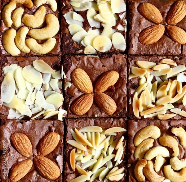 Fototapeta Top view, Homemade chocolate brownies with almond and cashew nut roast, Homemade bakery and dessert 