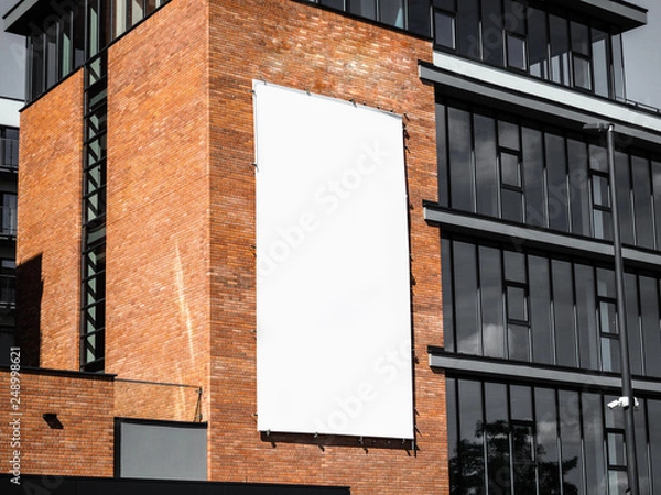 Fototapeta University, company office building facade, Blank white paper board at grunge brick red wall texture background, Mock up ads template, Business presentation content concept. 