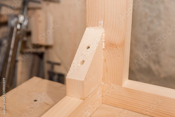 Obraz Wooden details. Details glued to each other. Carpentry workshop.