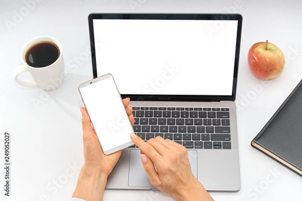 Fototapeta workplace with laptop, notepad, apple and cup of coffee, top view