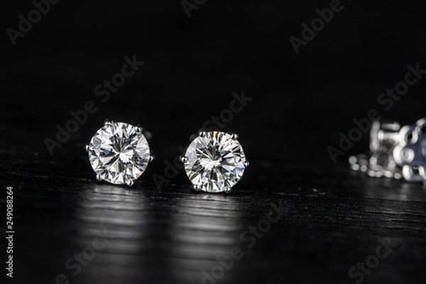 Obraz diamond earring on black background