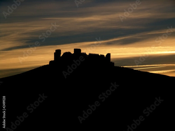 Fototapeta castle silhouette at sunset