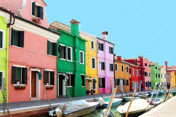 Obraz island of burano. Venice. Italy. island with bright houses. bright juicy rich photo with residential small colorful houses. pink, green, yellow, red house in Italy. unusual architecture. houses with f