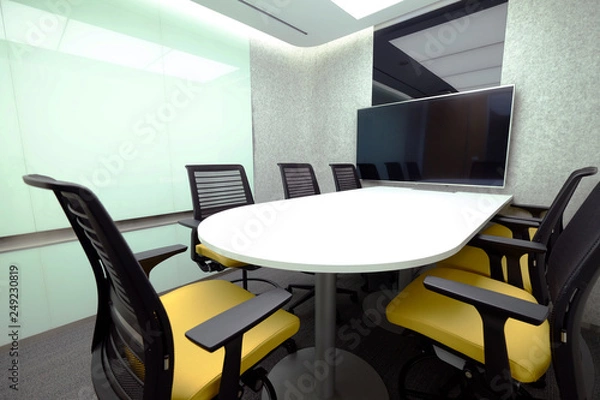 Fototapeta Small meeting room with whiteboard and television accessory for teleconference