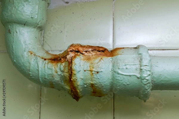 Obraz old cracked sewer pipe. rusty pipe