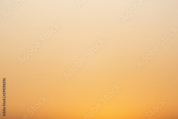 Obraz abstract blurred orange color gradient of sunset sky. abstract background, no generate color. natural colors.