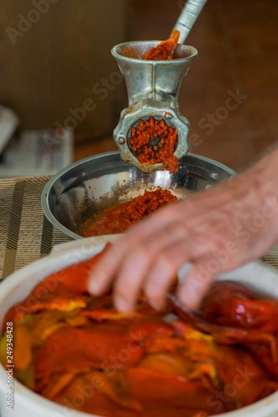 Obraz Grinding paprika for Ajvar