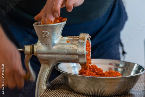 Obraz Grinding paprika for Ajvar