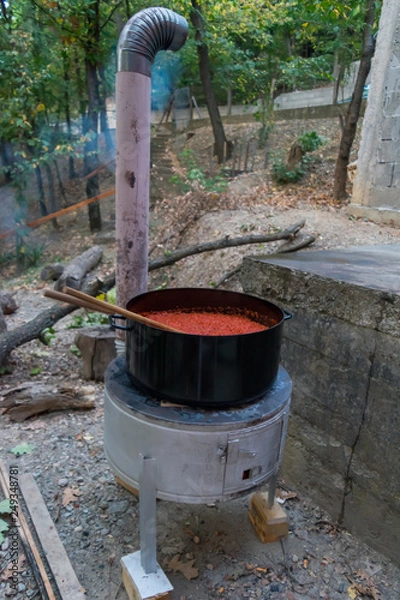 Obraz Cooking Ajvar in pot