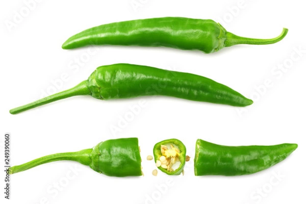 Fototapeta green hot chili peppers with slices isolated on white background top view