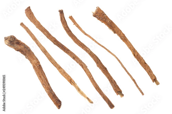 Obraz licorice roots isolated on white background. top view