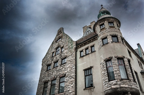 Obraz Dramatic sky with dark clouds over Alesund. Norway