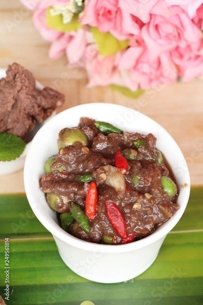 Fototapeta Chili shrimp paste delicious on wood backgroung