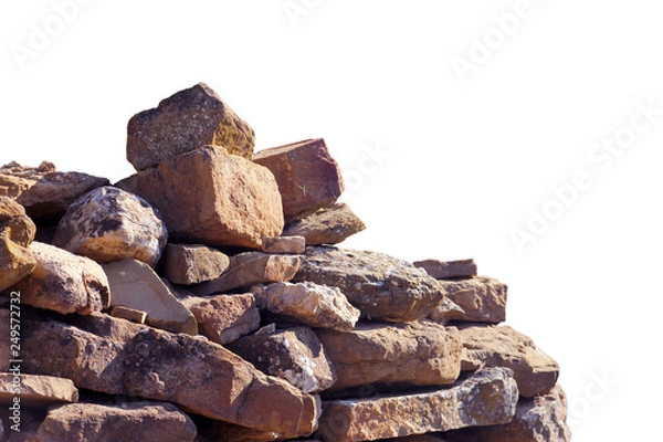 Obraz old ancient ruined pile of bricks and stone blocks foreground closeup isolated on white background