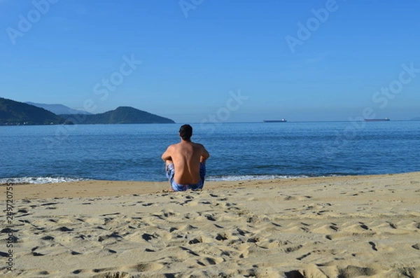 Obraz young man on the beach
