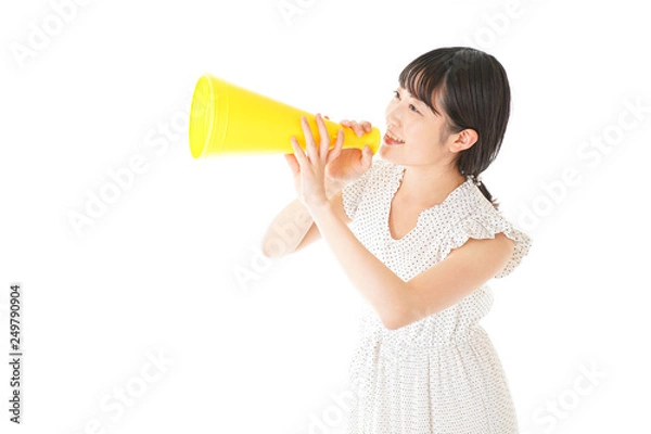 Fototapeta メガホンを使い応援をする若い女性