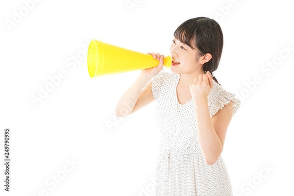 Fototapeta メガホンを使い応援をする若い女性