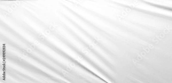 Fototapeta White silky soft cloth background - satin fabric with folds