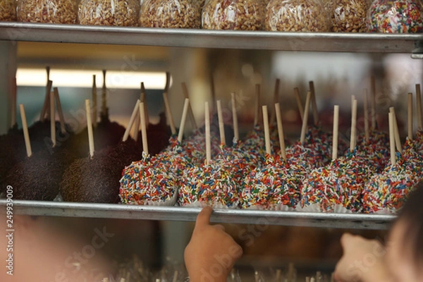Obraz candy apples with sprinkles at the fair