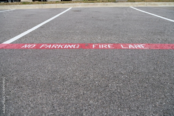 Fototapeta View of Open Parking Spaces With Cars parked on the Other Size