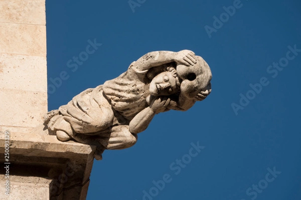 Obraz Famous stone gargoyle of the Lonja de la seda, in Valencia, Spain. It is  one of the most beautiful civilian Gothic building in Europe.