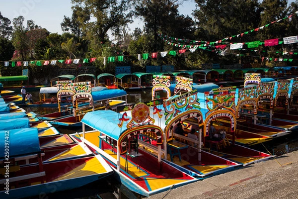 Fototapeta Colorful Boats on Embarcadero of Xochimilco in Mexico City