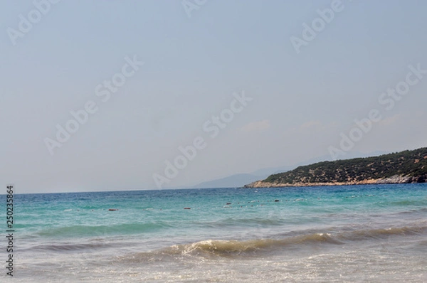 Fototapeta The beach and the sea. Waves. Relaxation. Travels