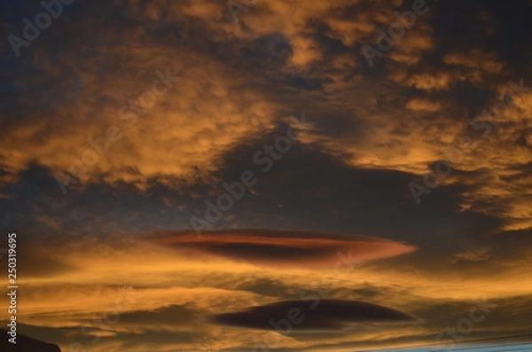 Fototapeta Lenticular clouds at sunset