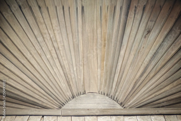 Fototapeta Vintage wooden gable of Thai style house with sun shape and radius background. It is believed that the sun will bring prosperity to the people in the house.