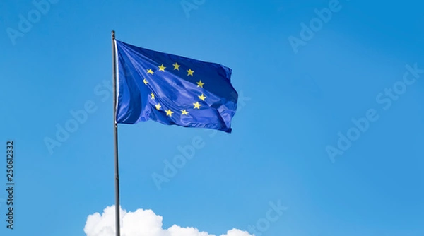 Obraz EU european flag flying against a clear blue sky