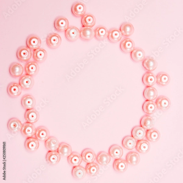 Obraz pink pearls on pink paper background