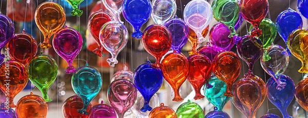 Fototapeta beautiful colorful murano glass balls handmade in Venice, Italy. Colorful balloons made of Venetian Murano Glass. Traditional carnival in Venice, selective focus