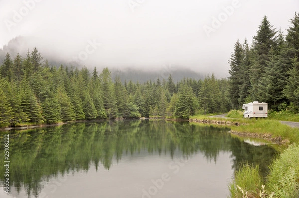 Obraz motor home passing pond