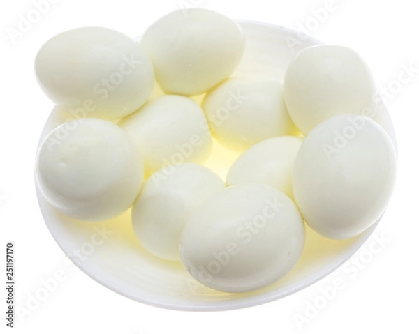 Fototapeta Peeled boiled eggs in a plate on a white background