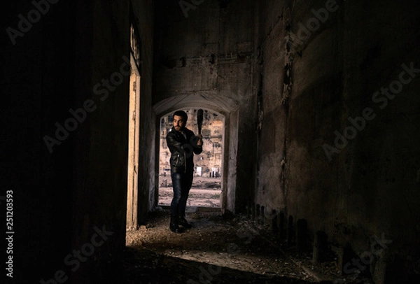 Fototapeta man in leather jacket and baseball bat