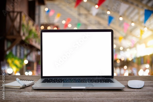 Fototapeta Desk Laptop with blank screen on table