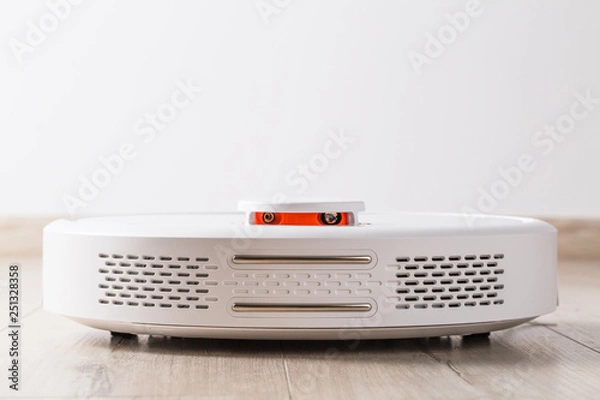 Fototapeta Smart robot vacuum cleaner