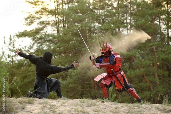 Obraz Samurai fight with ninjas on a background of forest and sand