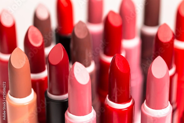 Obraz Set of lipstick tubes on  white background. Cosmetic photography