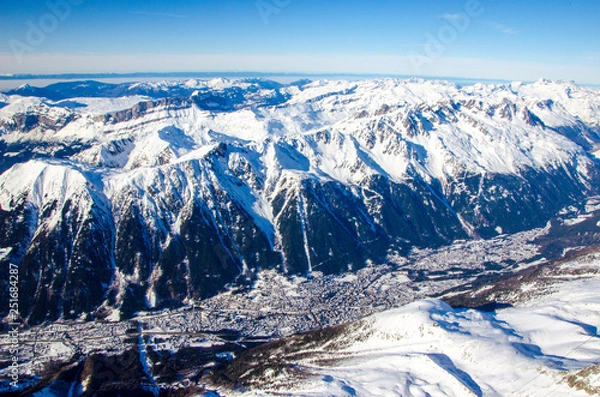 Fototapeta Chamonix Mont Blanc - best destination for winter holiday full of skiing, snowboarding and relaxing. The top view of this town with peaks of french Alps.