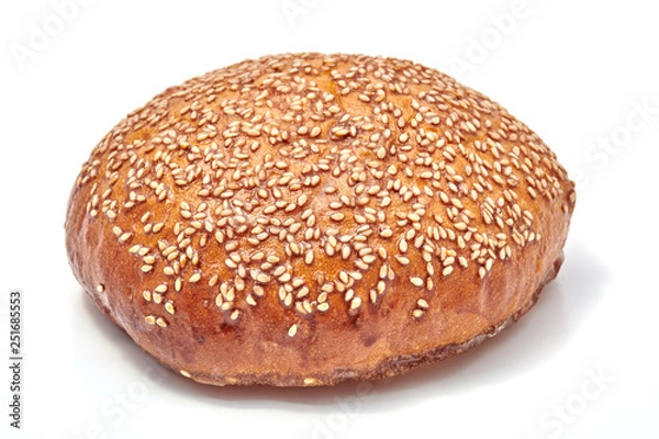 Fototapeta Hamburger bun with sesame seeds isolated on white background